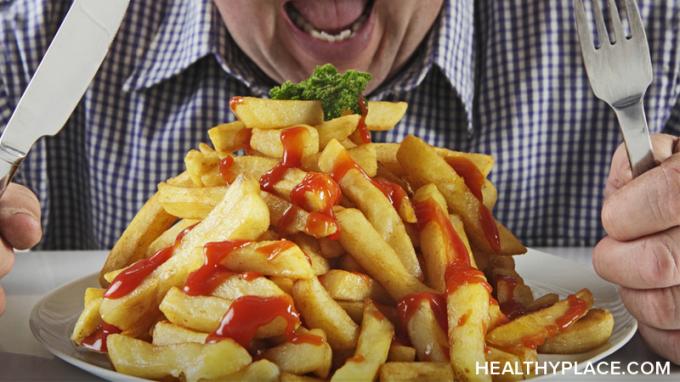 Binge spiseforstyrrelse definisjon. Oppdag forskjellen mellom overstadig spising og overspising og hvordan overstadig spiser skiller seg fra overspisere.